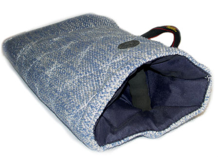 Soft puppy sleeve with handle.