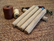 Dog play role made of roled jute with handle