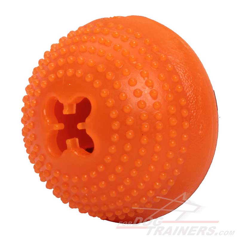 https://www.fordogtrainers.com/images/dog-training-equipment-categories-pictures/Orange-dog-toy-for-treats-with-dotted-surface-TT36-big.jpg